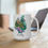 Thumbnail: Fantasy style bird and flowers on a white mug with personalized name. Colorful Petrykivka style Ukranian Folk Art style. Striking original art on custom mug. 