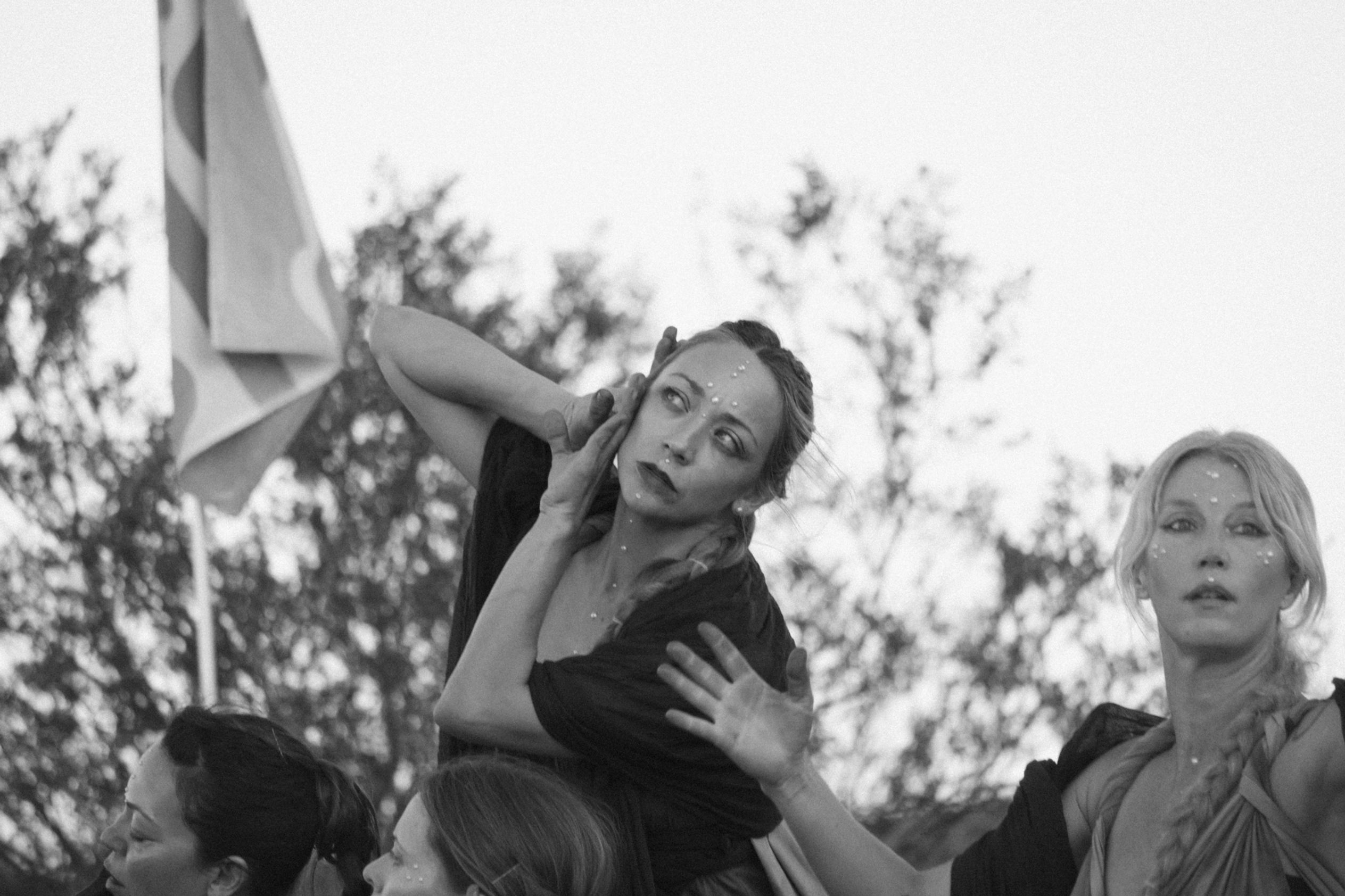 Contemporary dancers performing outdoors during an event in Joshua Tree, artistic performance photography in the High Desert