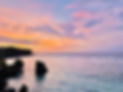 Painted sky sunset on the shore in Bali that feels etheric