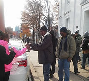 feeding pic outside downtown.png