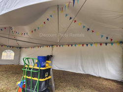 20 x 40 Marquee tent rental with multicolor banners