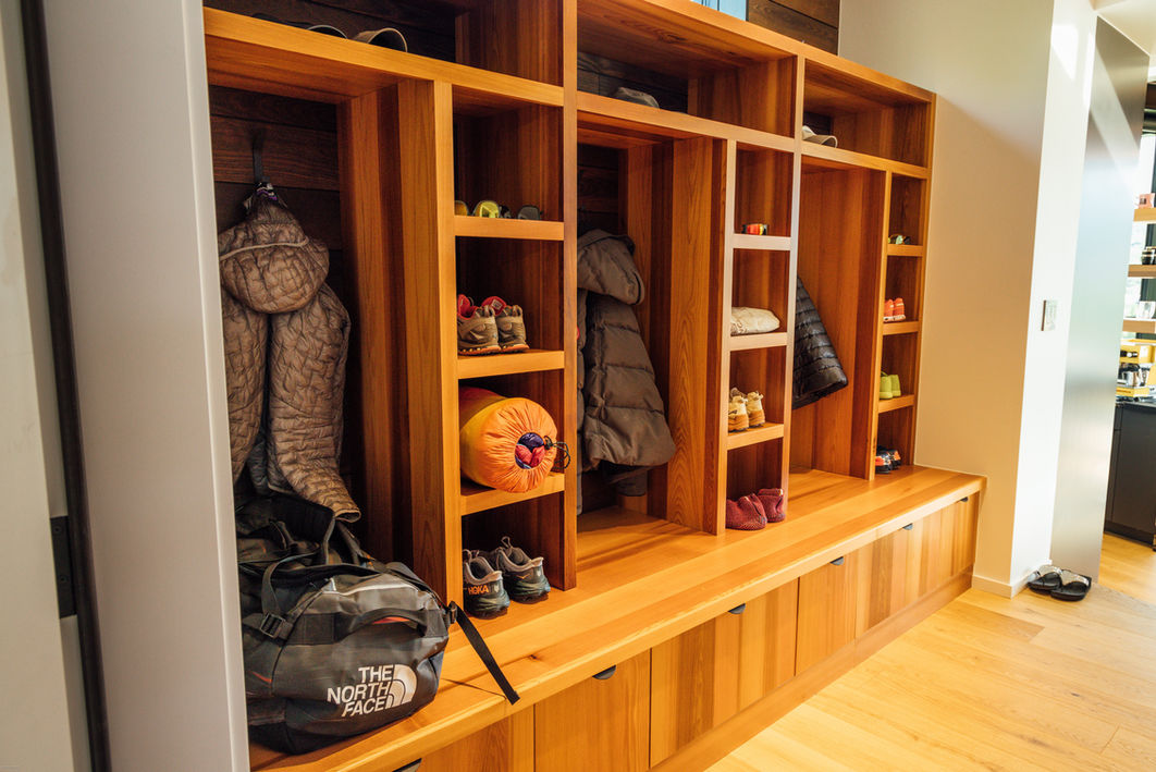 Denver home mudroom featuring VOGO Cabinets custom built-in storage with open shelves for shoes and gear