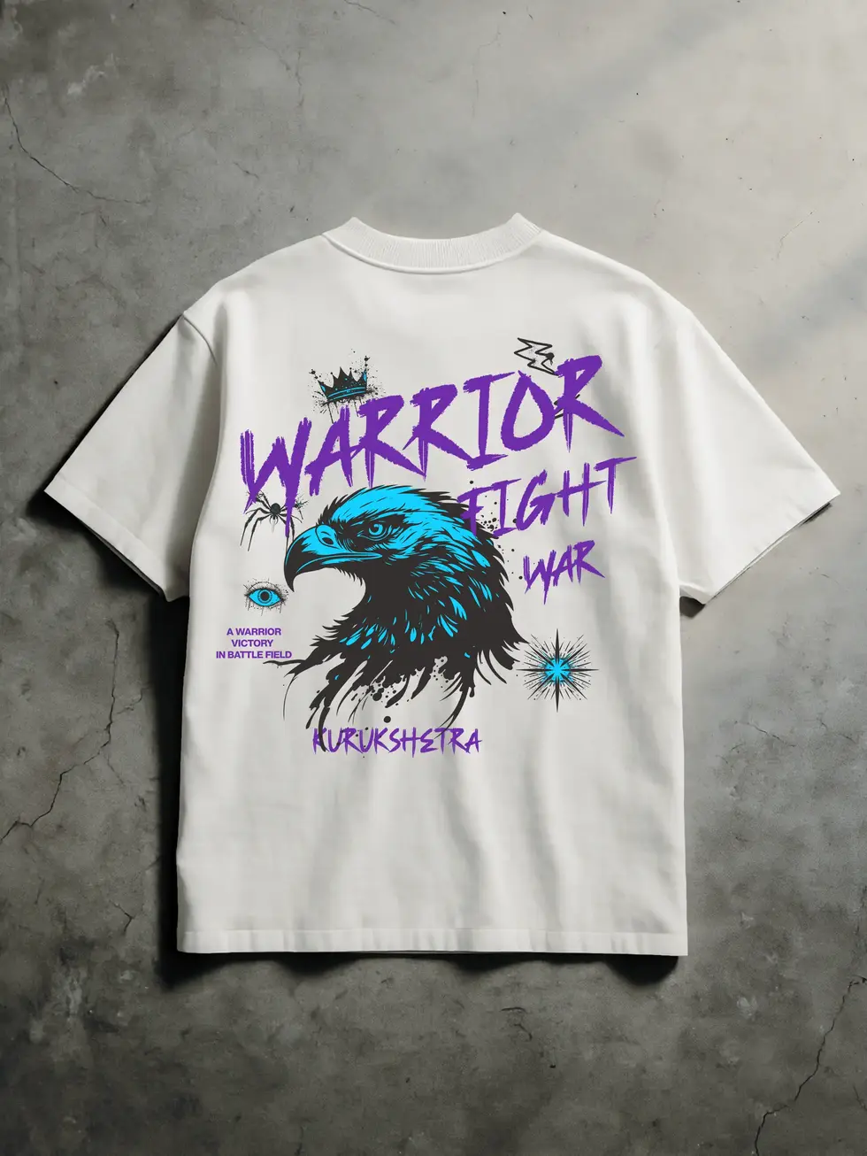 White oversized t-shirt with bold graphic of eagle head, graffiti text “Warrior Fight War,” and Kurukshetra branding