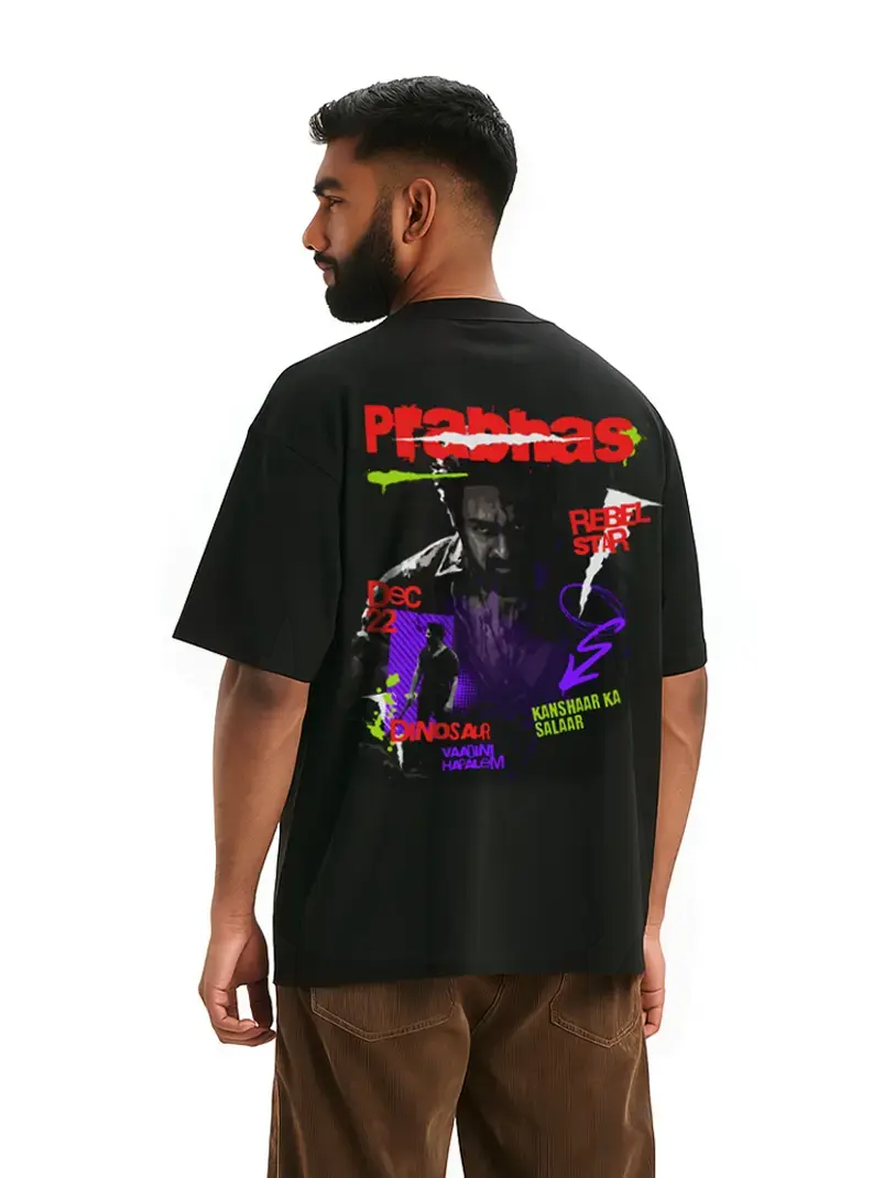 Model wearing Rebel Star Oversized Graphic T-shirt showing detailed back print