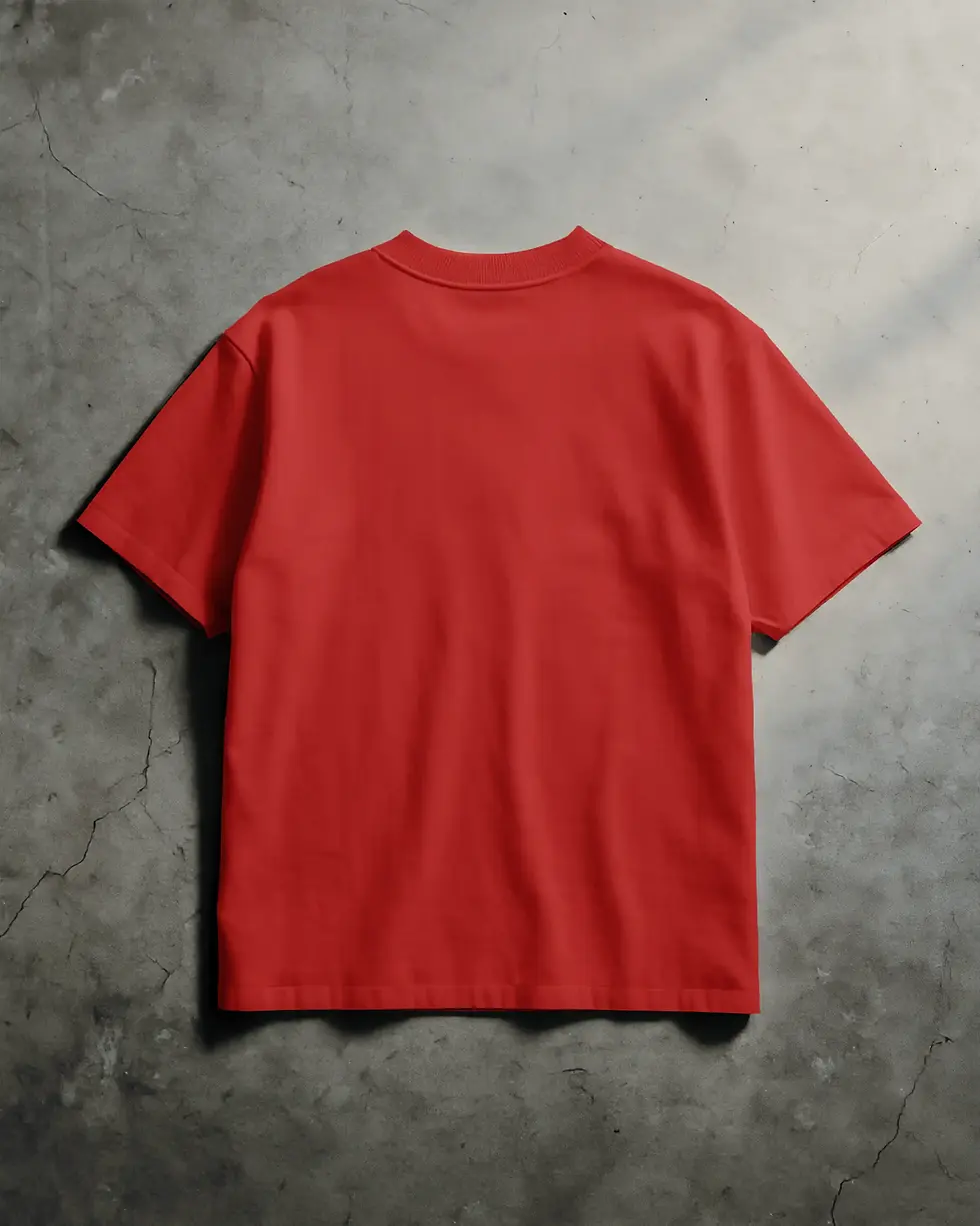 Plain red oversized t-shirt on a concrete background