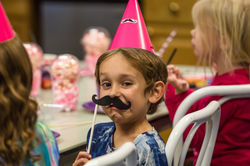 Mustache Bash wearing a Stache