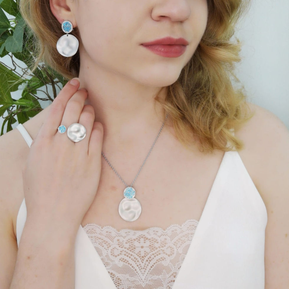 Thumbnail: DISC HAMMERED RING WITH TIFFANY BLUE TOPAZ IN STERLING SILVER