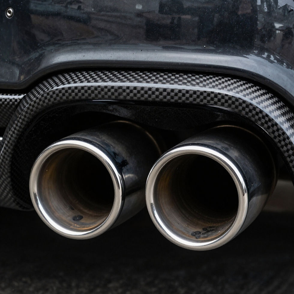 Detailed car exhaust and carbon fibre trim