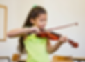 Student learns to play violin at music school