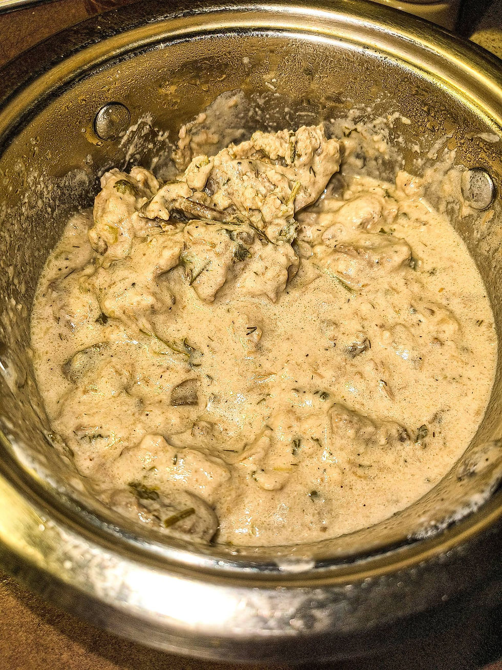 Sautéed-Veal-Fillets-with-Mushrooms-in-deep-metal-pot