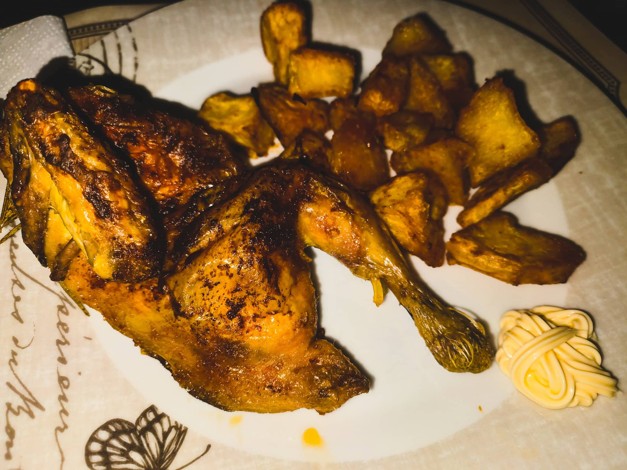 Roast young Rooster with crispy Potatoes