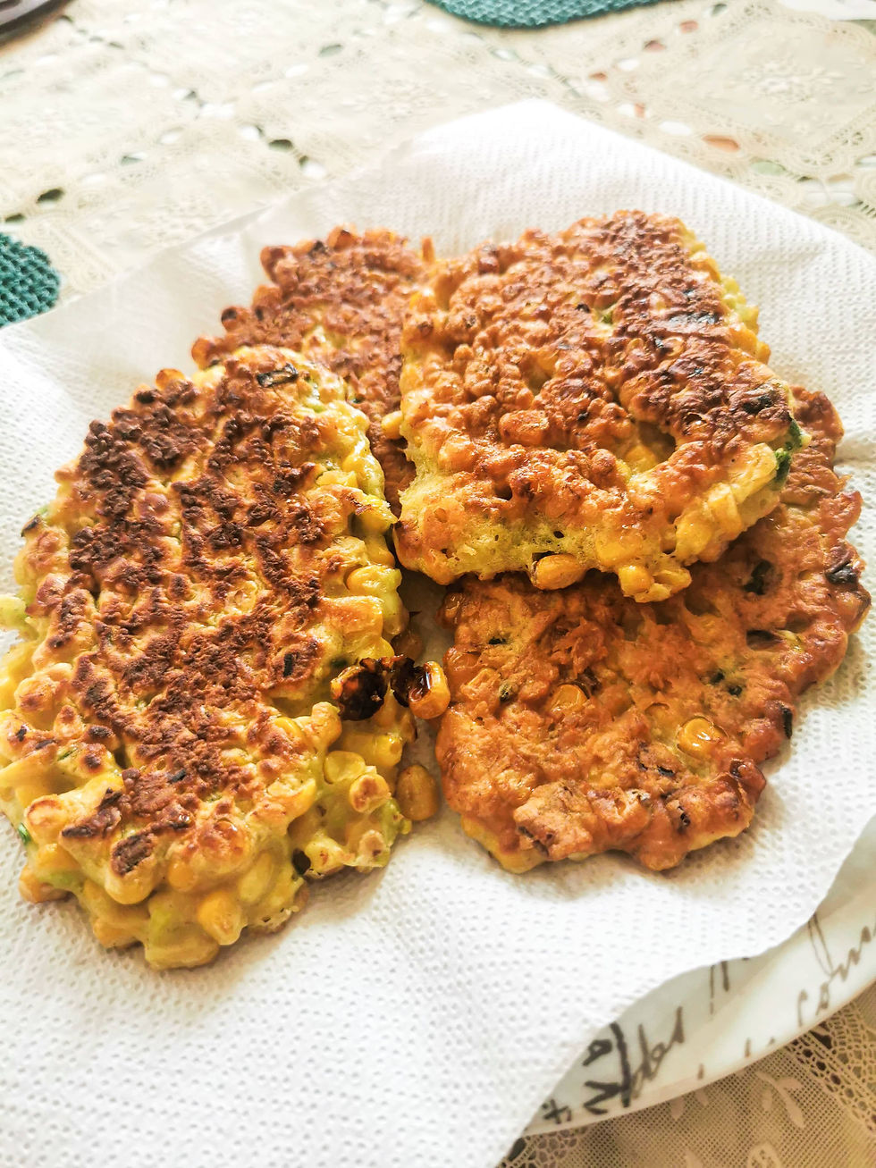 corn-fritters-with-cheese-in-plate-with-napkin