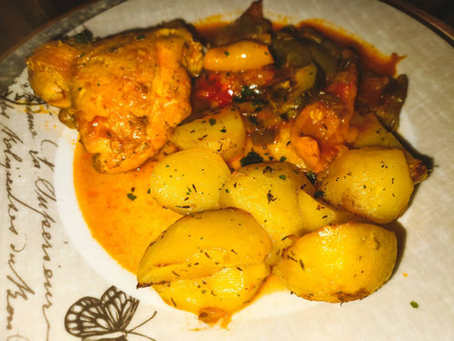 Chicken-meat-in-rich-Vegetables-in-Tomato-sauce-with-baked-Potatoes