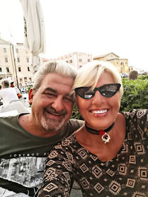 Helena smiling with a man