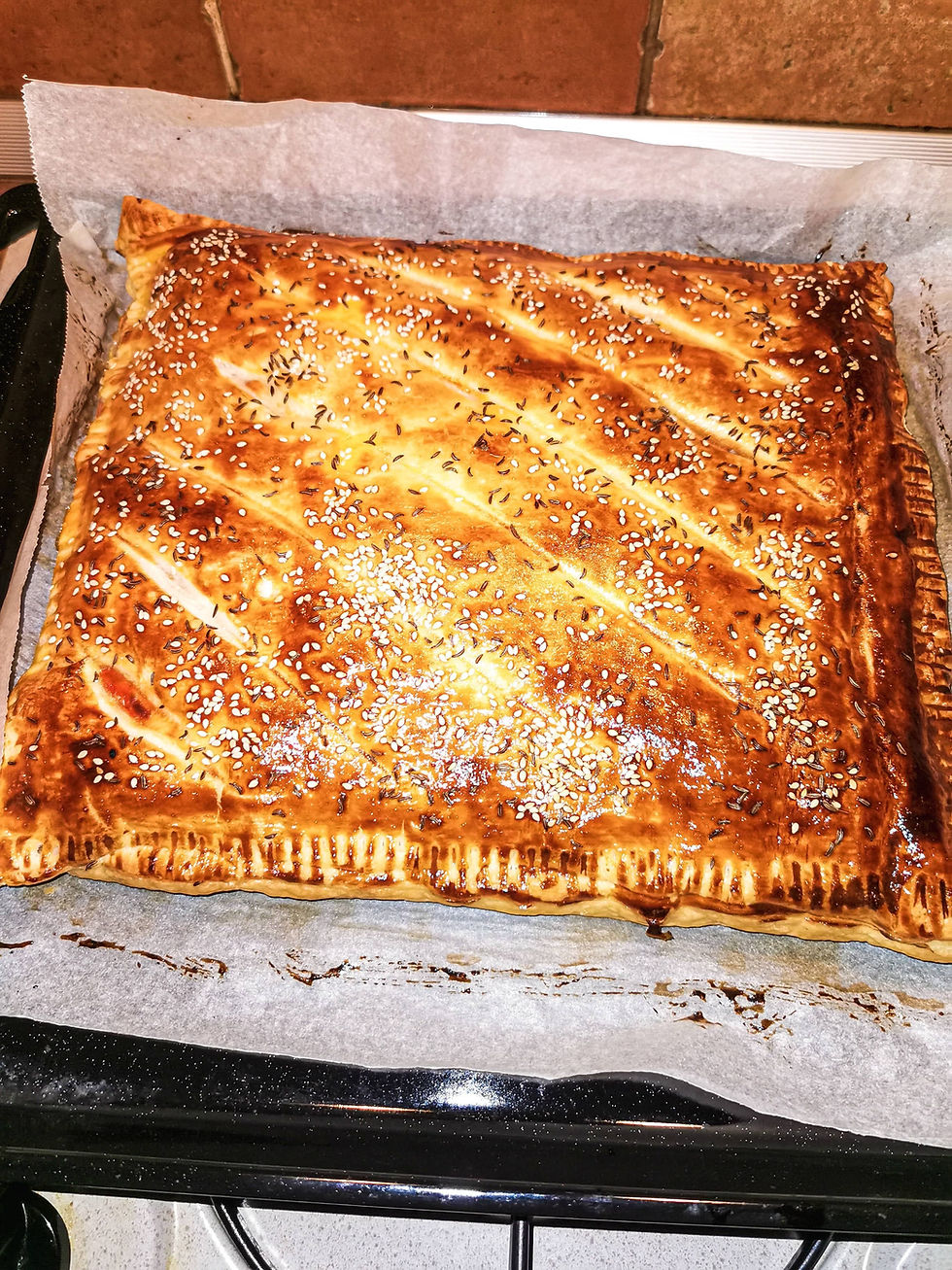 puff-pastry-with-ham-and-cheese-in-baking-tray