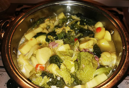 Hearty vegetable stew with potatoes and greens