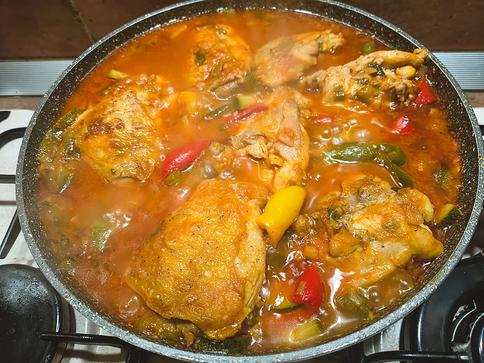 Chicken meat in rich Vegetables in Tomato sauce with baked Potatoes