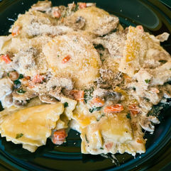 Ravioli with Porcine in Cream Sauce with Mushrooms