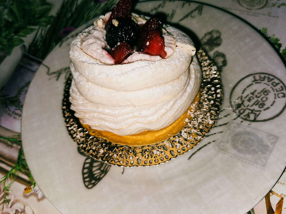 mini-pavlovas-dessert-on-white-plate