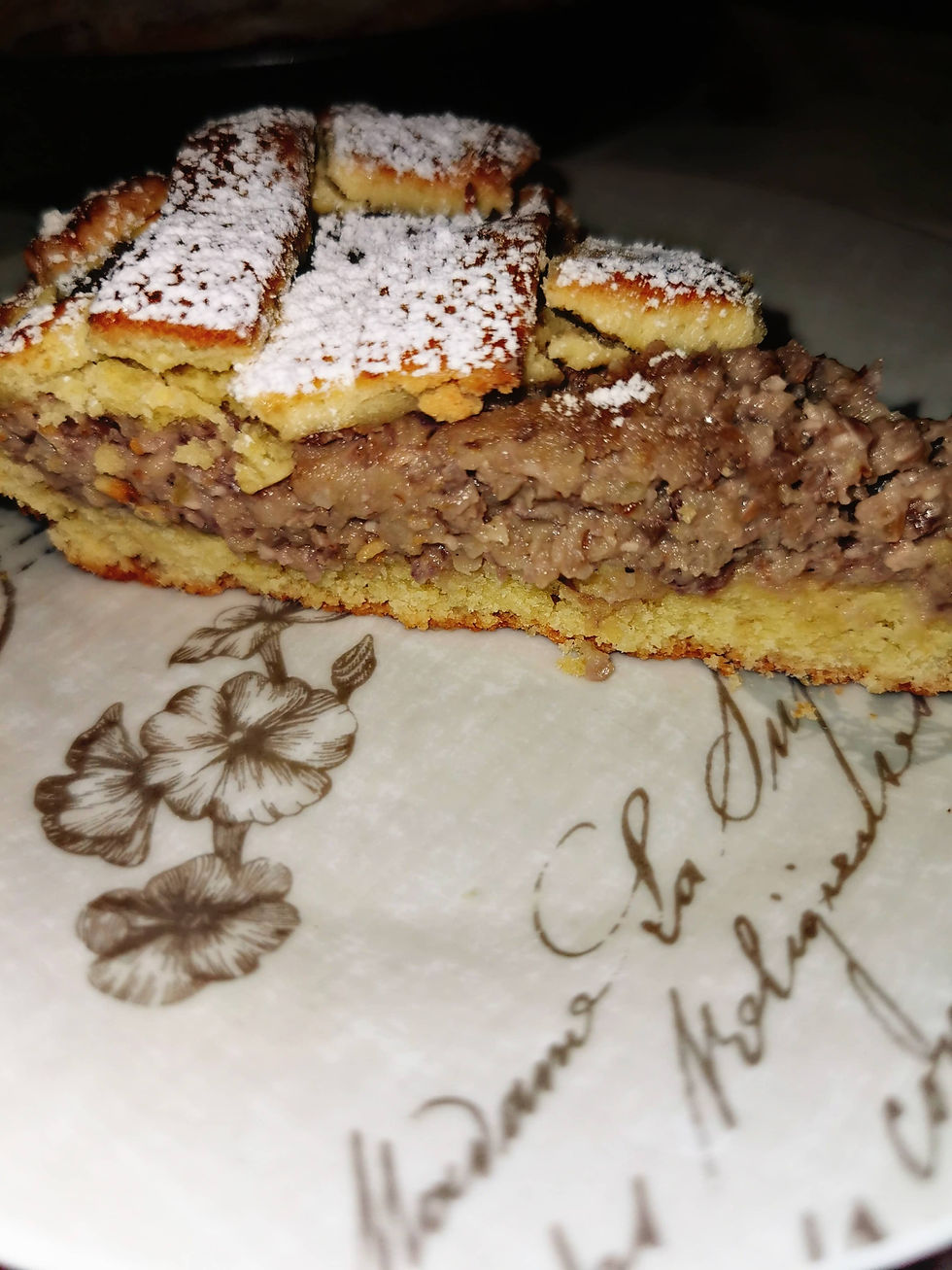 sliceof*apple-walnut*tart-on-white-plate