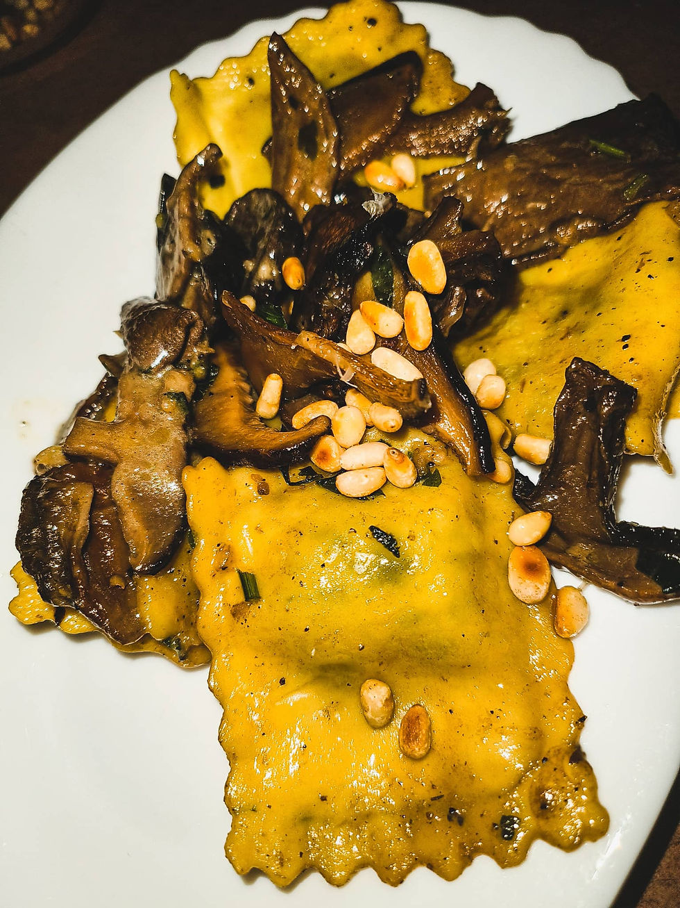 Ravioli-in.Butter-sauce-with-Mushrooms-and-Pine-nuts