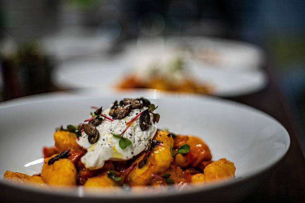 pasta-with-pumpkin-cream-in-deep-white-plate