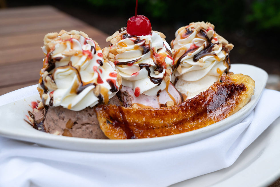 Banana-split-dessert-with-cream-and-cherry-on-top