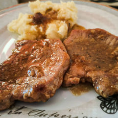 Pork steaks in Sauce