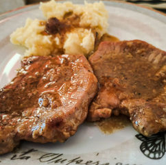 Pork steaks in Sauce