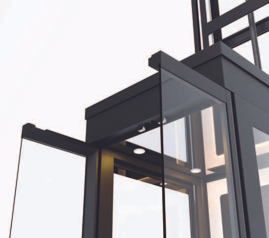Close-up view of a modern glass-panel home lift door
