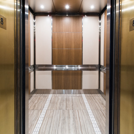 PEACE HILLS TRUST TOWER - ELEVATOR CAB INTERIORS