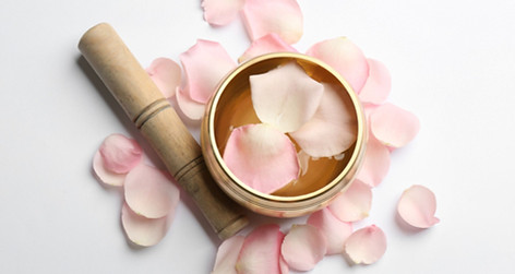 Singing bowl with rose petals.jpg