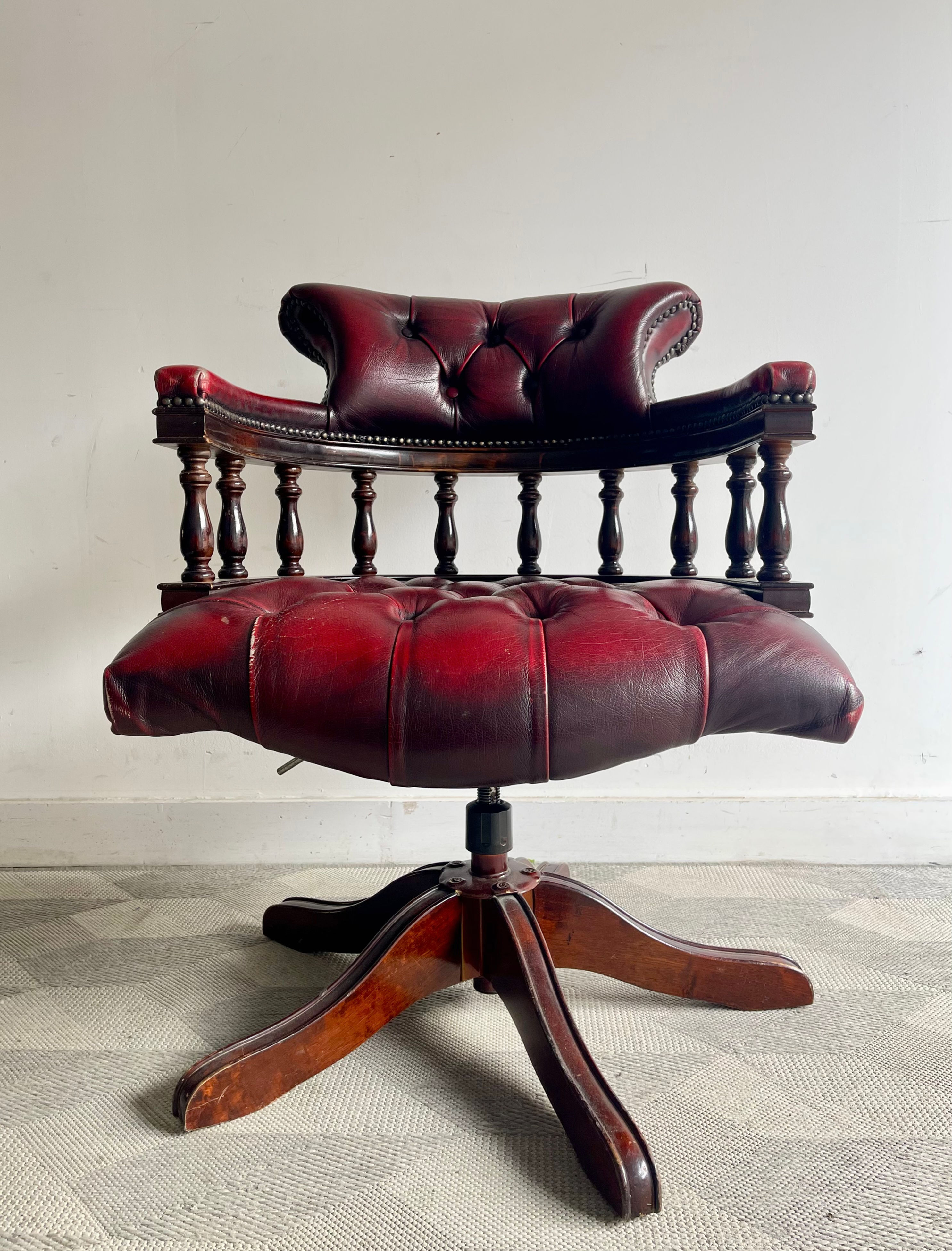 Vintage Red Leather Swivel Captains Chair front