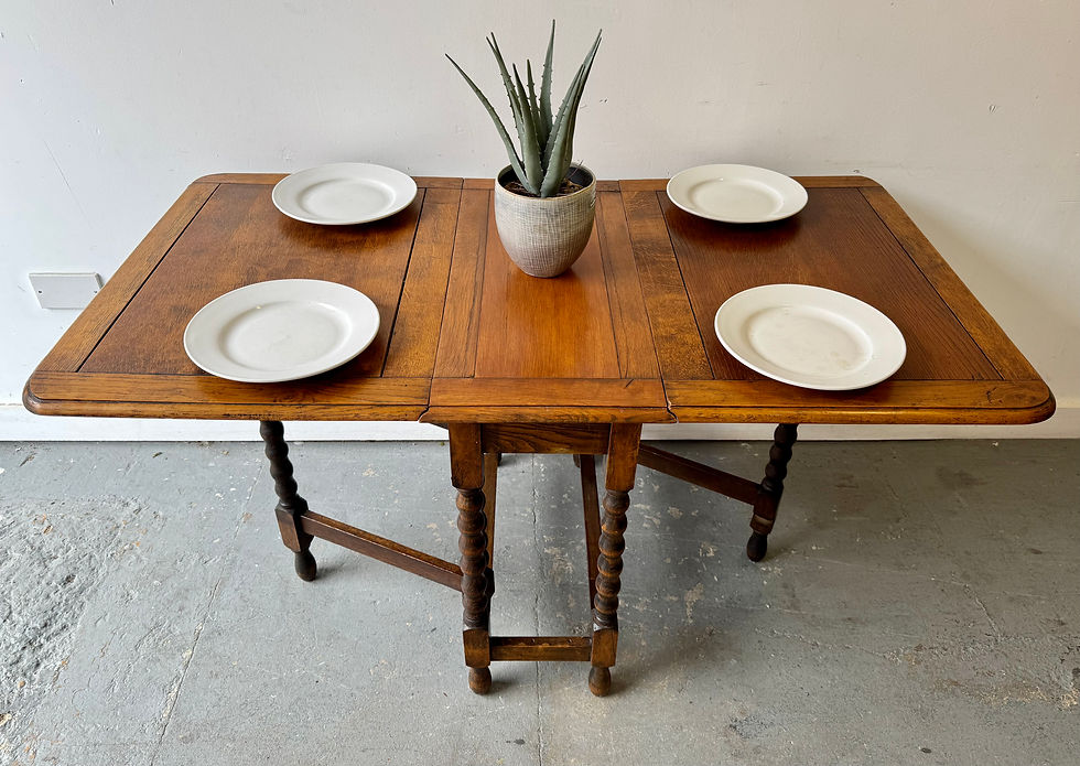 Thumbnail: Antique Gateleg Dining Table with plates