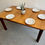 Thumbnail: Large Extending Dining Table by G Plan with plates
