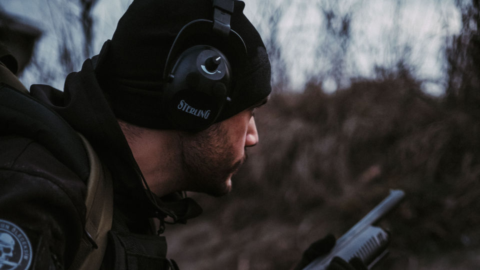 Pump Action Shotgun with Reliable Performance. The Sovran SP-7 is pictured here in action, emphasizing smooth pump cycling and consistent follow-through.