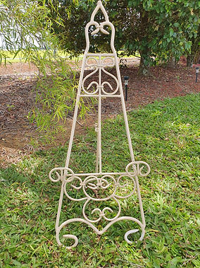 Small ornate cream event easel