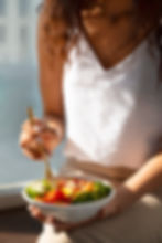 person-eating-salmon-bowl.jpg