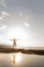 woman-posing-beach-with-sun.jpg
