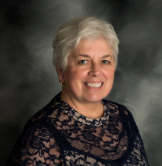 Ann Higgens headshot, owner and lead advisor of Beacon Financial Organizing