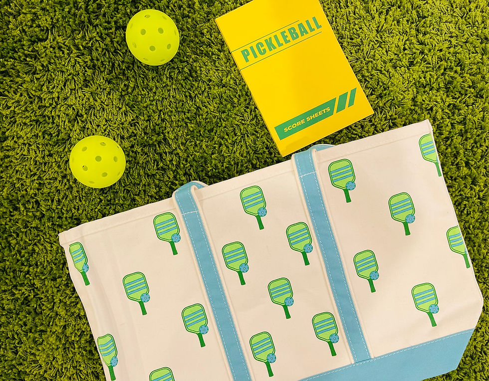 Thumbnail: Canvas pickleball tote with repeating teal and light blue paddles and teal handles