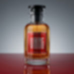 Ministry of Sillage Project Viking Parfum for Him in a clear glass bottle with amber fragrance liquid, black cap, red label.