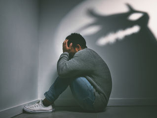 Man dealing with his demons