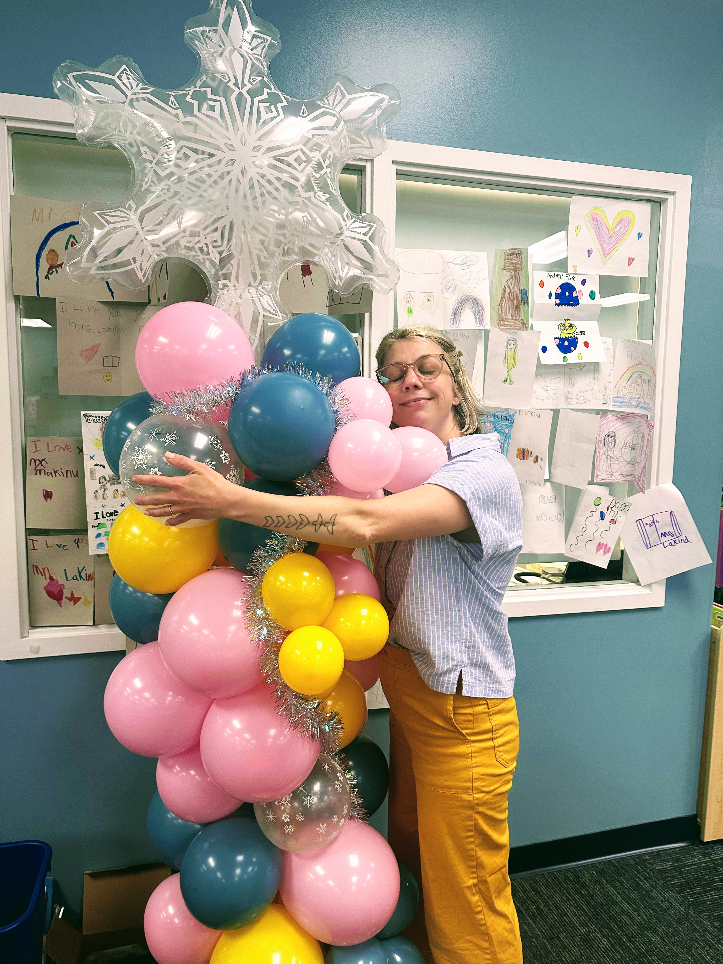 Maddie Frost at school visit with balloons