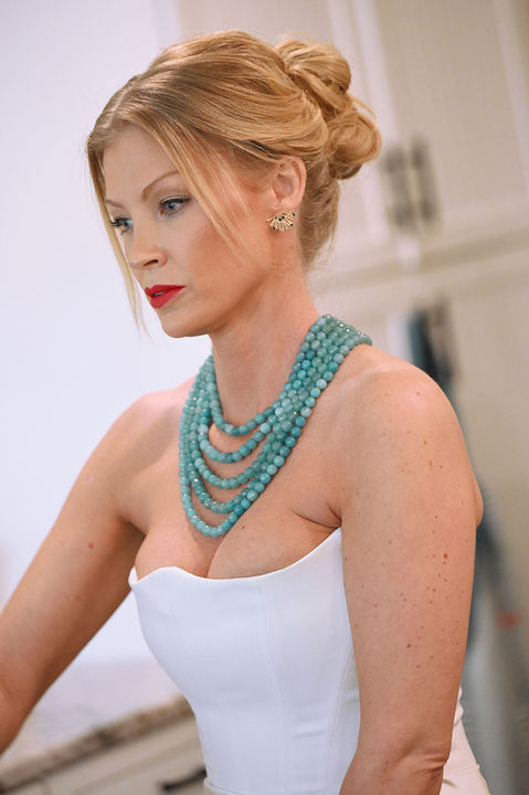 Bride with soft natural makeup and red lip by Giulia Martin in Tega Cay, South Carolina, preparing for her wedding day