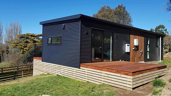 new deck on black tiny home