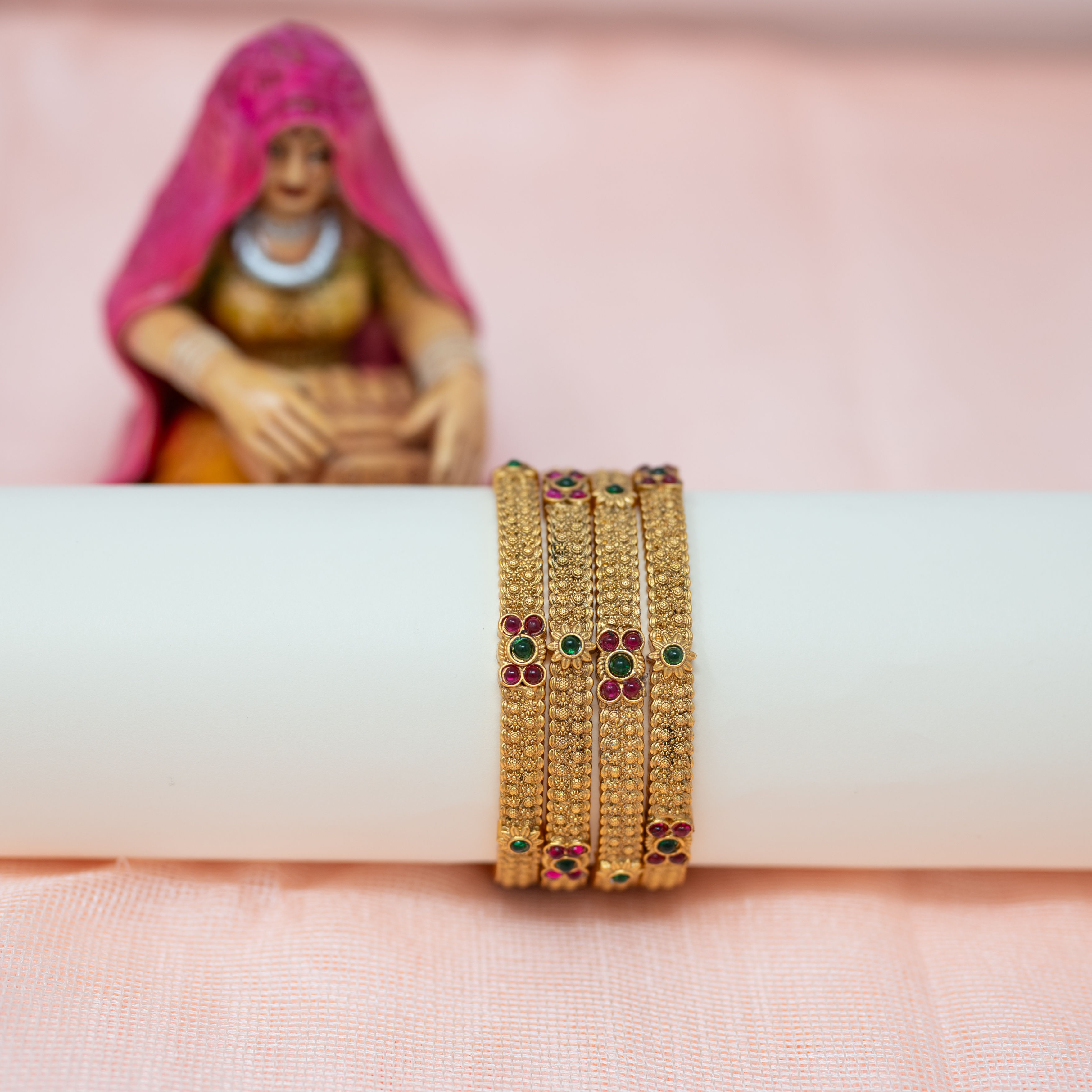 Elegant Gold Bangles with Gemstone Accents