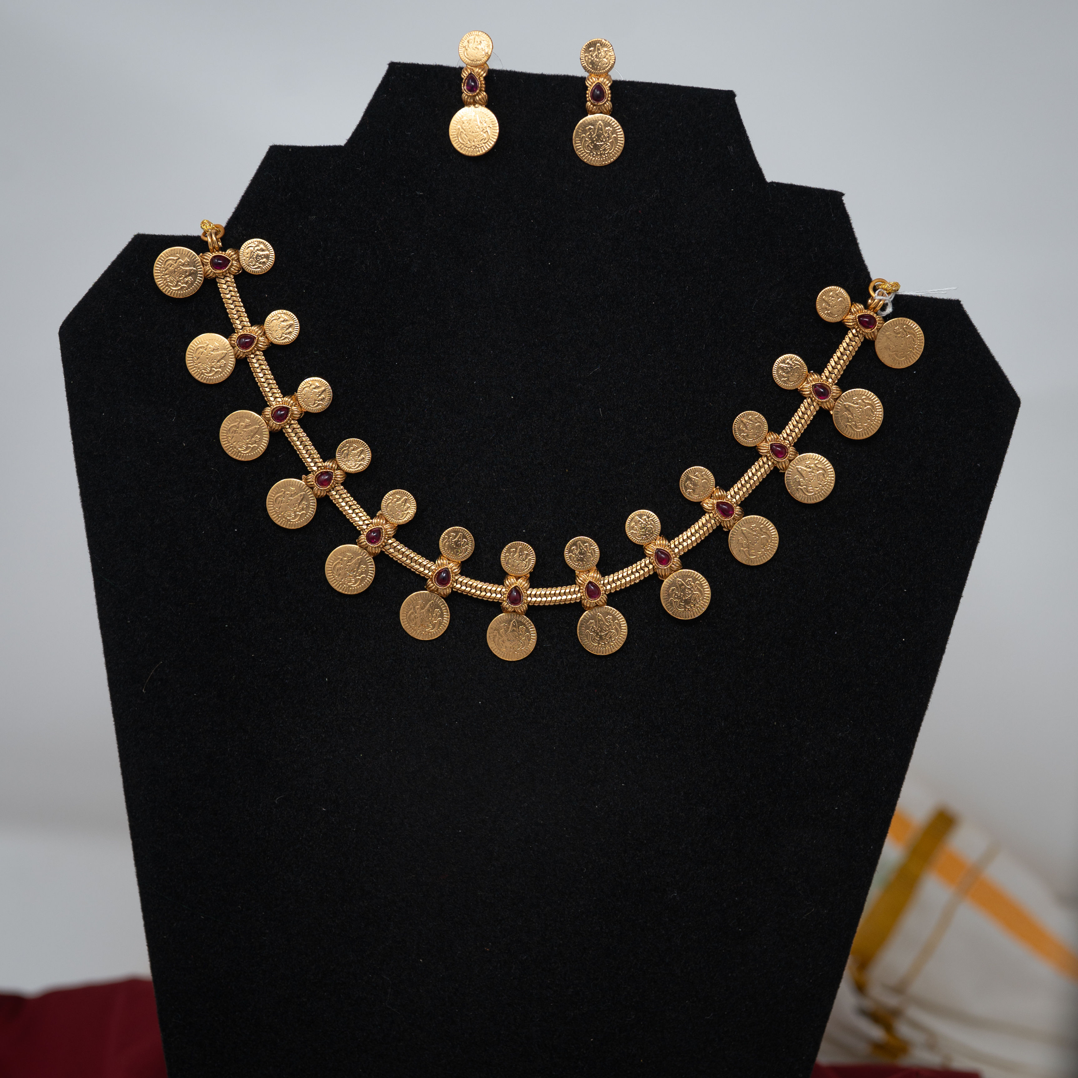 Golden Harmony: Traditional Coin Necklace and Earrings Set with Gemstone Accents