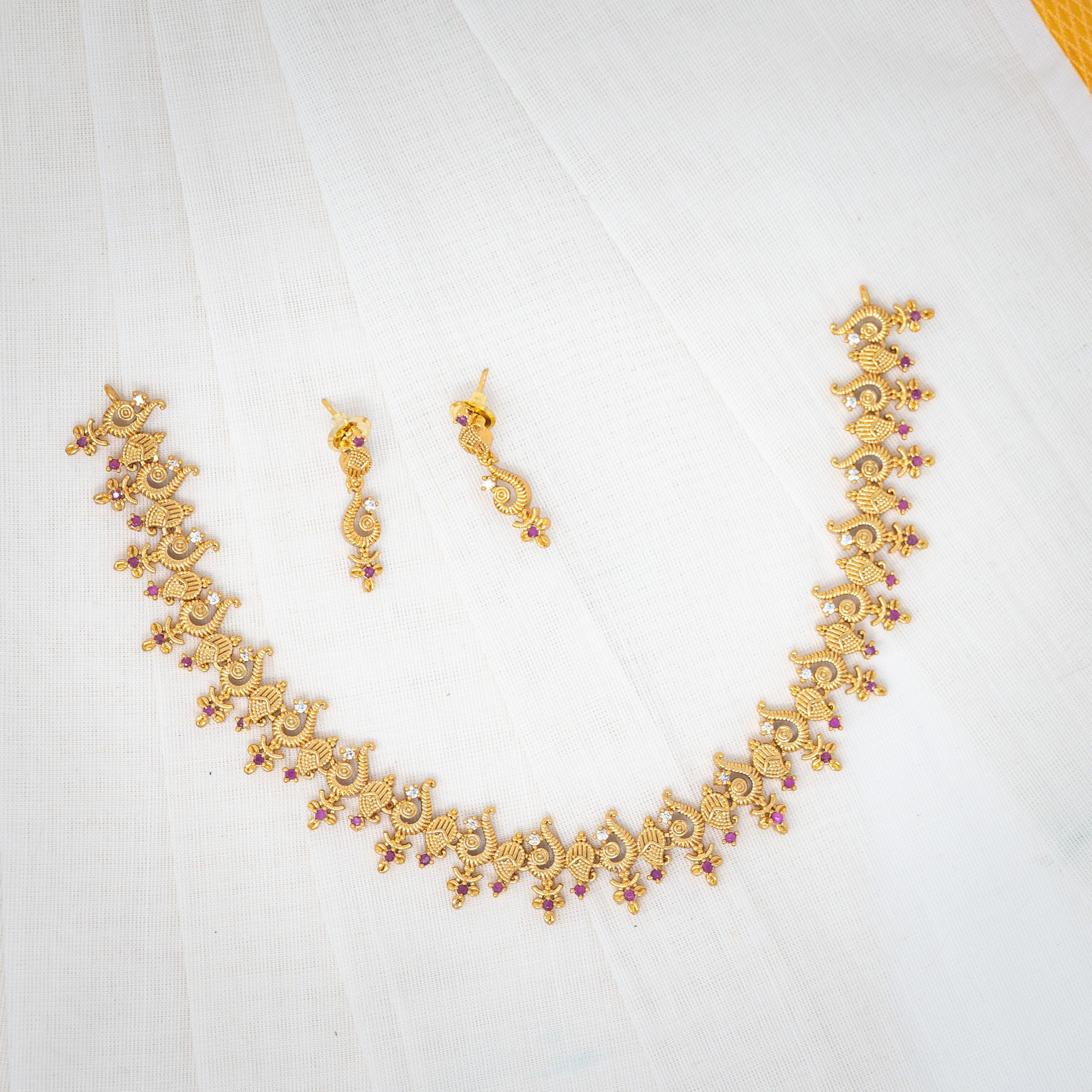 Majestic Orchid: Gold Necklace and Earring Set with Pink Gem Accents