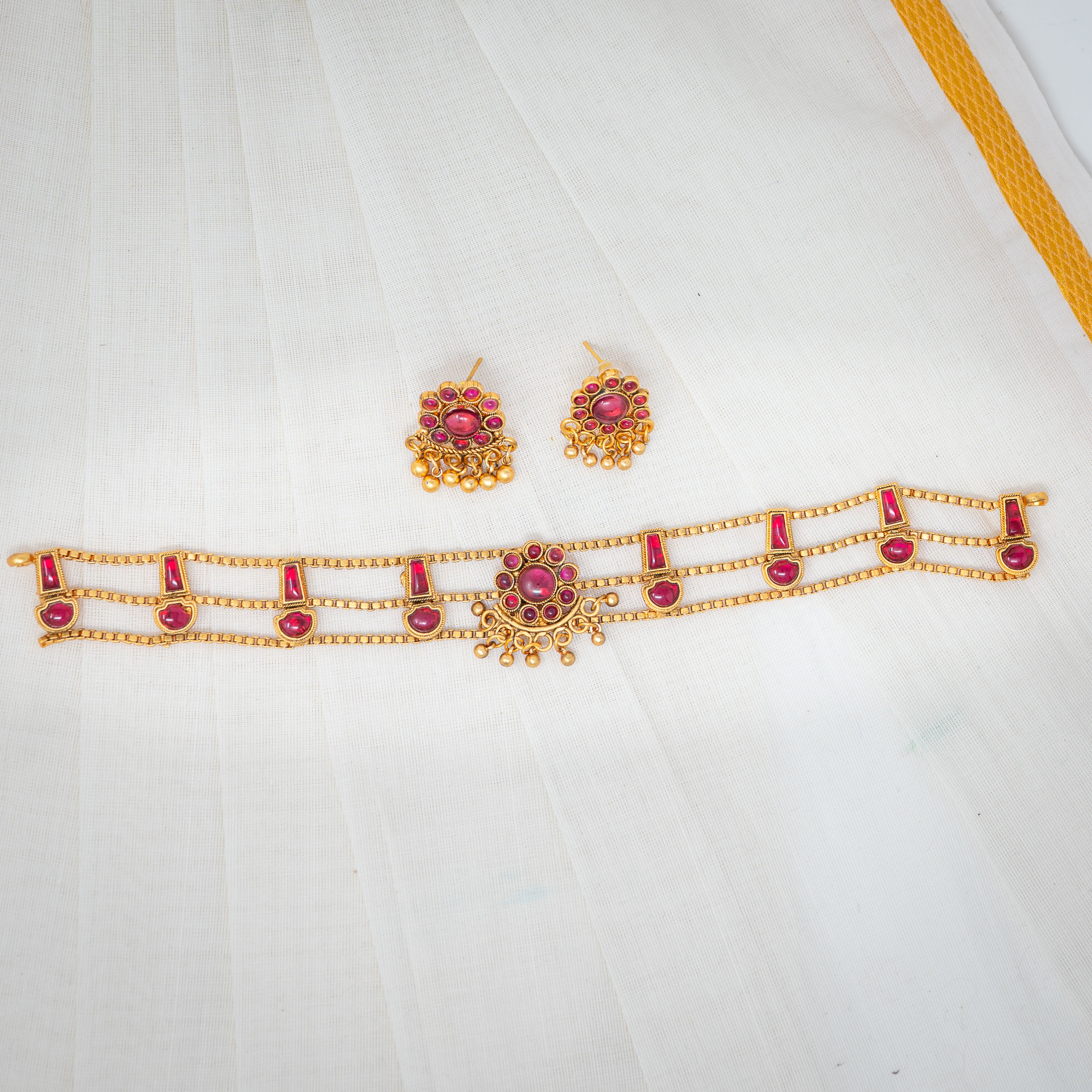 Crimson Majesty: Traditional Gold Choker and Earring Set with Ruby Stones
